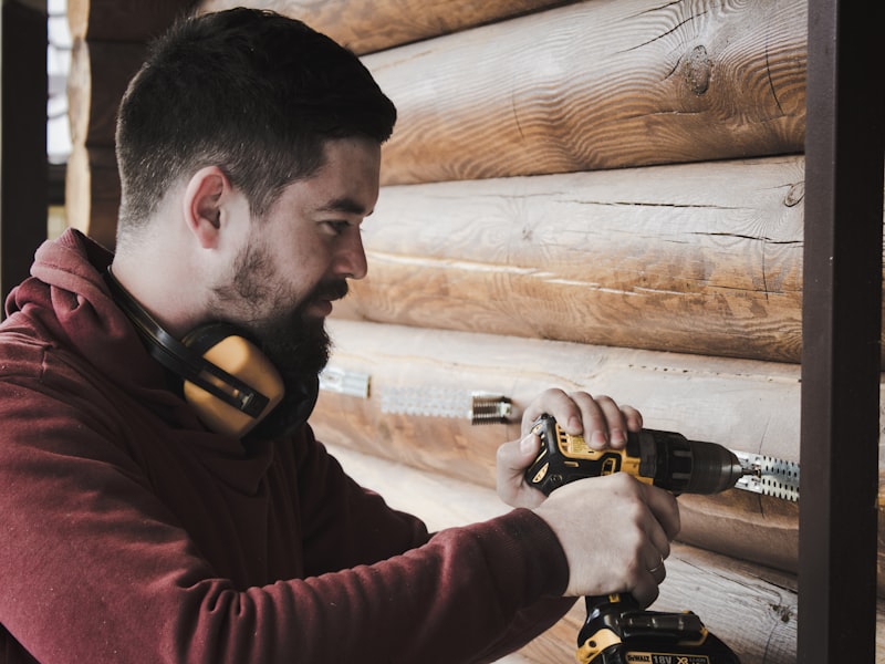 Professional using a power tool during an installation