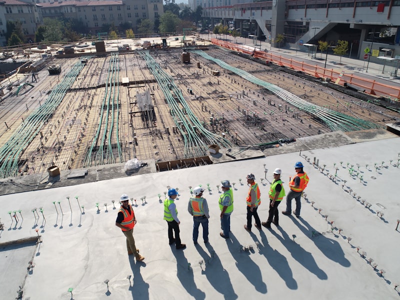 Work crew coordinating tasks on a job site